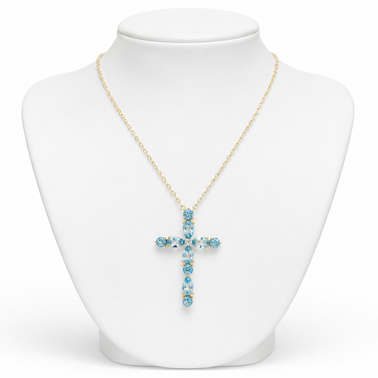 Collar cruz dorada con piedras azules