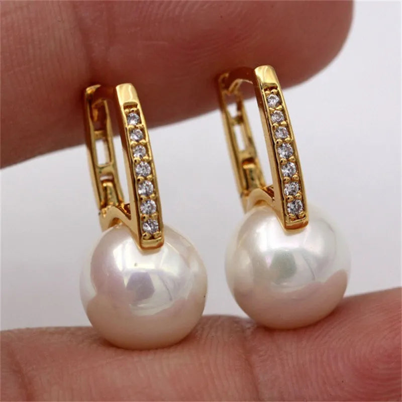 Aros dorados con perlas y circonias