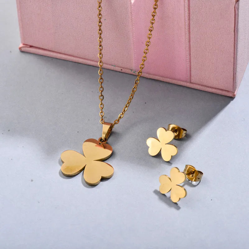 Conjunto dorado trébol