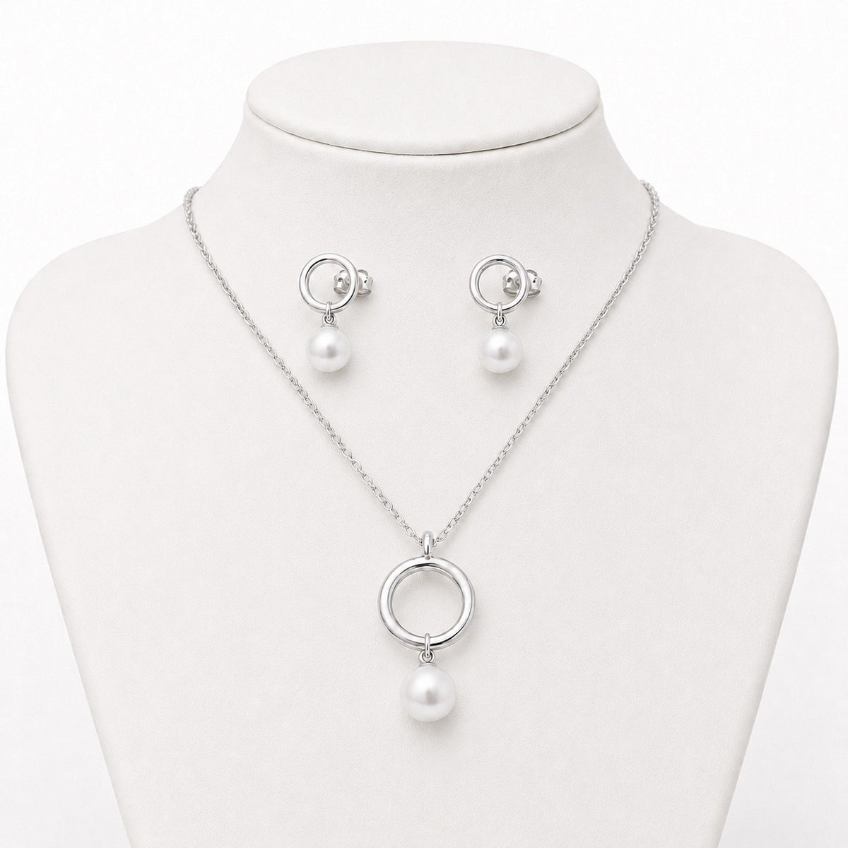 Conjunto dorado con perlas redondas