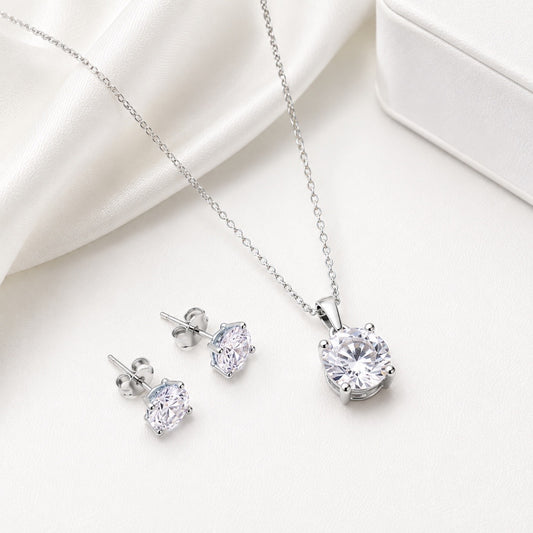 Conjunto plateado con circonias brillantes