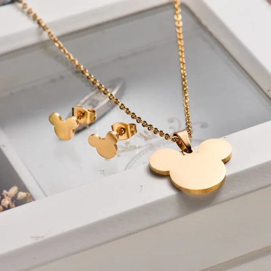 Conjunto dorado silueta icónica