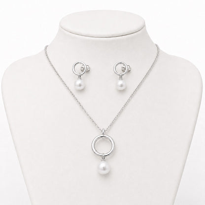 Conjunto dorado con perlas redondas